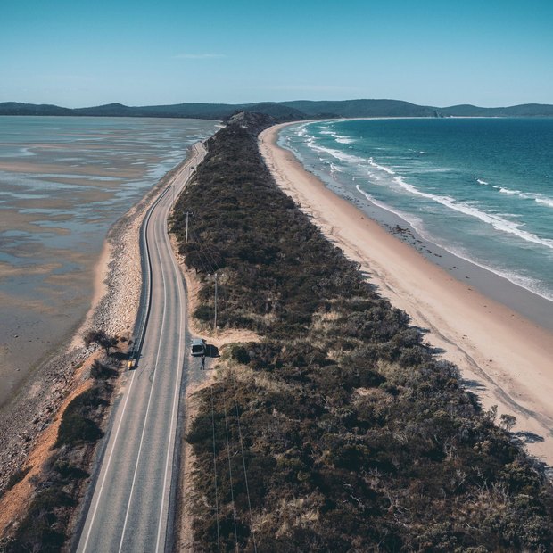 Aerial view of a coastal road on Bruny Island, Tasmania.
